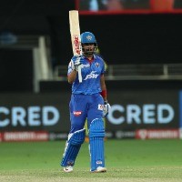 Shaw carried off the field after being hit on the shin