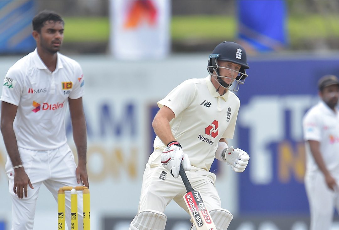 Root's hundred leads England's charge on a rain-curtailed day