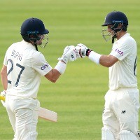 Root, Burns revive England after jittery start 