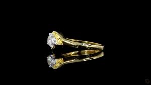 radiant-gold-embraces-a-dazzling-oval-cut-diamond-5