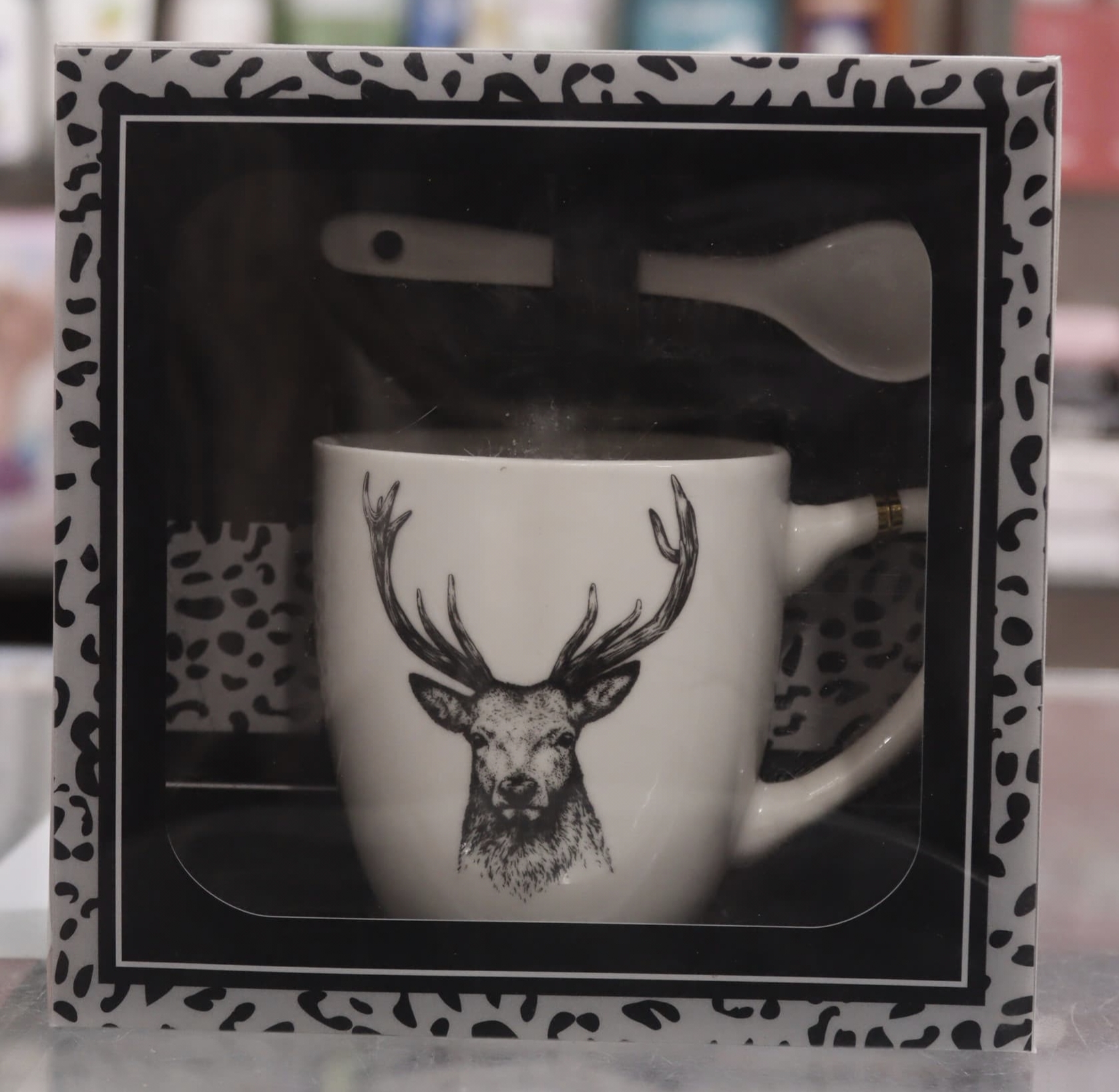 Coffee mug with spoon