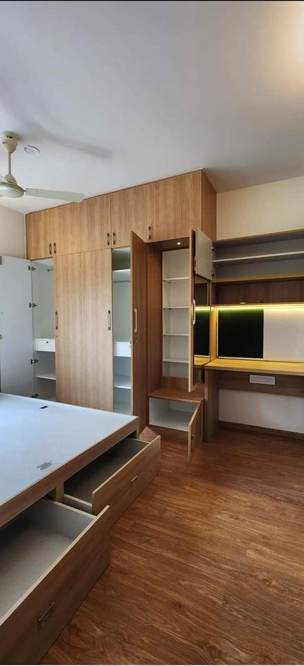 Clean and simple wardrobe design for bedroom with ample storage