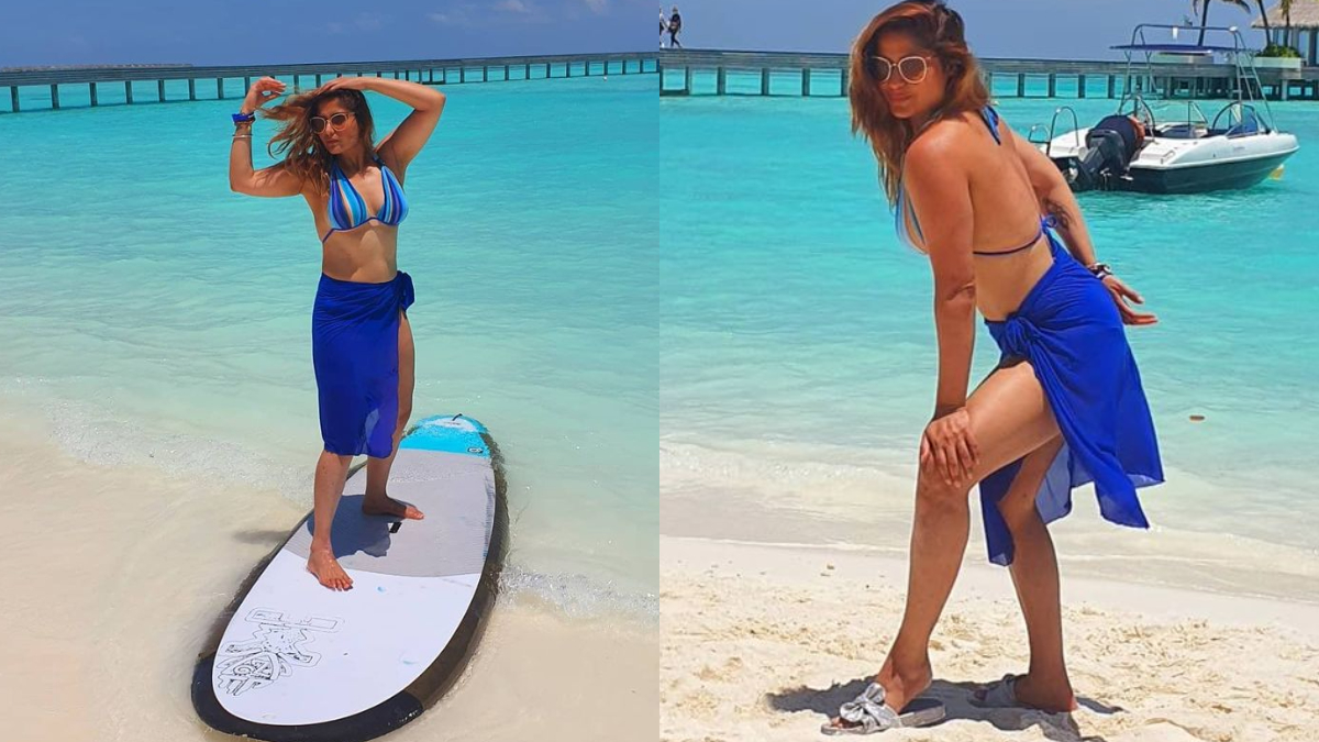 Aarti Singh Photos: ‘बिग बॉस 14’ की कंटेस्टेंट रही आरती सिंह (Aarti Singh) इन दिनों मालदीव में अपनी छुट्टियां बिता रही हैं। इसके साथ ही वह सोशल मीडिया पर भी काफी एक्टिव दिखाई दी। आरती सिंह ने अपने सोशल मीडिया अकाउंट पर बिकिनी फोटोज पोस्ट कर तहलका मचा दिया हैं। मालदीव के बीच पर बोल्ड पोज देते हुए आरती सिंह ने अपनी कई तस्वीरें खिचवाई हैं। टीवी अदाकारा का यह अंदाज उनके फैंस को काफी पसंद आ रहा है। इसमें आरती सिंह ब्यू कलर की मोनोकिनी में नजर आ रही हैं। आप भी देखें इन वायरल तस्वीरें- (फोटो साभार- @ Aarti Singh)