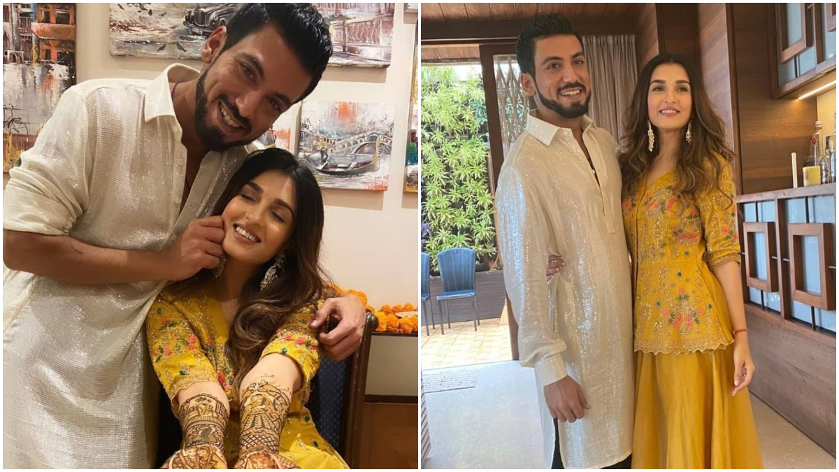 Pandya Store actress Shiny Doshi and Lavesh Khairajani’s intimate mehendi ceremony: 'पांड्या स्टोर' फेम अभिनेत्री शाइनी दोशी (Shiny Doshi) आज बॉयफ्रेंड लवेश खैरजानी (Lavesh Khairajani) संग आज शादी के बंधन में बंधने जा रही हैं। शादी के एक दिन पहले अदाकारा की शान से मेहंदी सेरेमनी हुई। इस सेरेमनी में परिवार के अलावा कुछ खास दोस्त हो शामिल हुए थे। शाइनी दोशी ने मेहंदी की रस्म की कुछ तस्वीरें सोशल मीडिया पर पोस्ट की हैं। जिसमें वह येल्लो आउटफिर में काफी खूबसूरत दिखाई दी। अभिनेत्री ने खुद इन तस्वीरों को सोशल मीडिया पर अपने फैंस के लिए पोस्ट की हैं। इस तस्वीरों में शाइनी अपने परिवार, दोस्त और अपने होने वाले पतिदेव के साथ जमकर धमाल करती नजर आ रही हैं। नजर डाले इन तस्वीरों पर- (फोटो साभार- @ Shiny Doshi)