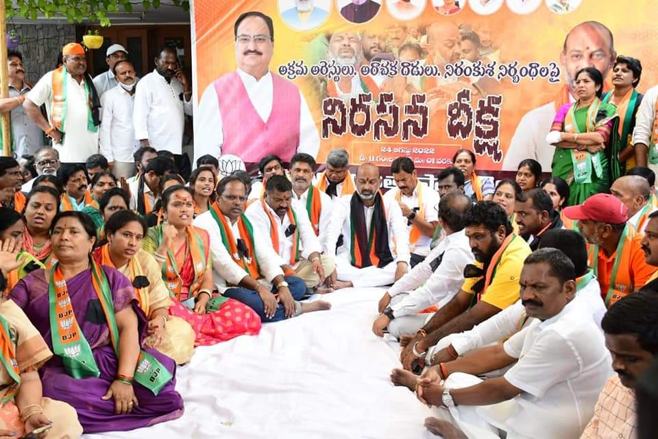 BJP state chief Bandi Sanjay, centre, with supporters at his residence in Karimnagar.