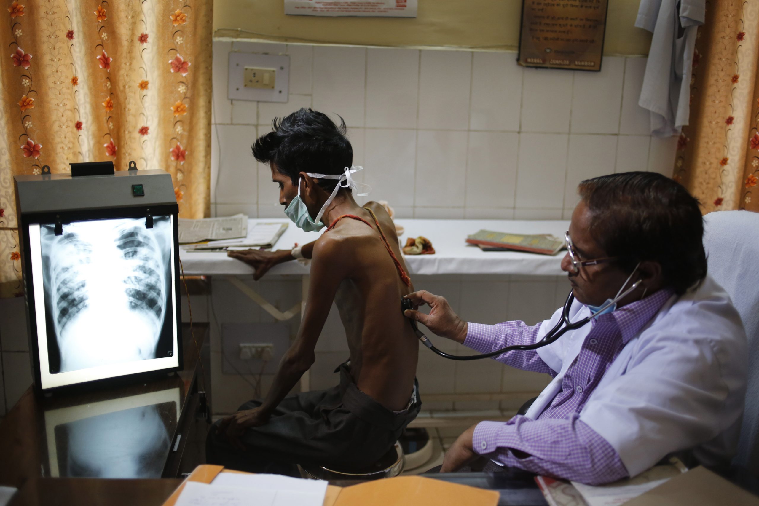TB Doctor examining a TB patient