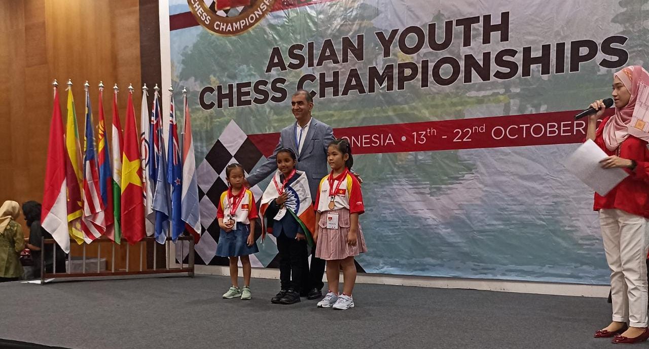 Charvi Anilkumar wins Asian Youth Chess Championship Charvi Anilkumar in the centre, along with Vietnam's Vo Mail Phuong and Duong Ngoc Nga. (Supplied)
