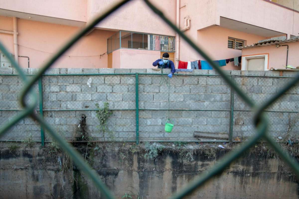 Wastewater surveillance Researcher drawing water from STPs for wastewater surveillance (#COVIDActionCollab)