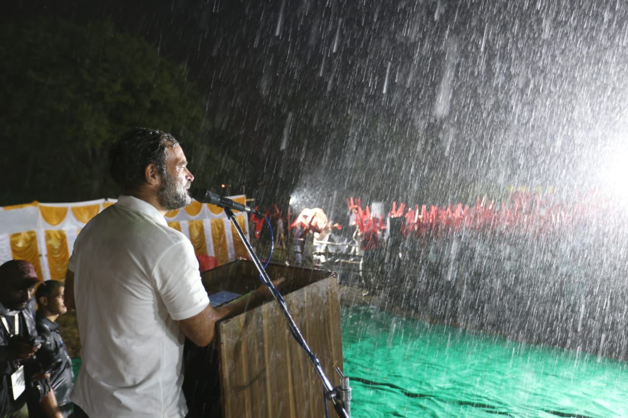 Rahul Gandhi addressing a Bharat Jodo Yatra gathering amid heavy downpour in Mysuru on Sunday. (Supplied) Rahul Gandhi addressing a Bharat Jodo Yatra gathering amid heavy downpour in Mysuru on Sunday. (Supplied)