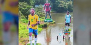 Giant cutouts of Messi, Ronaldo and Neymar