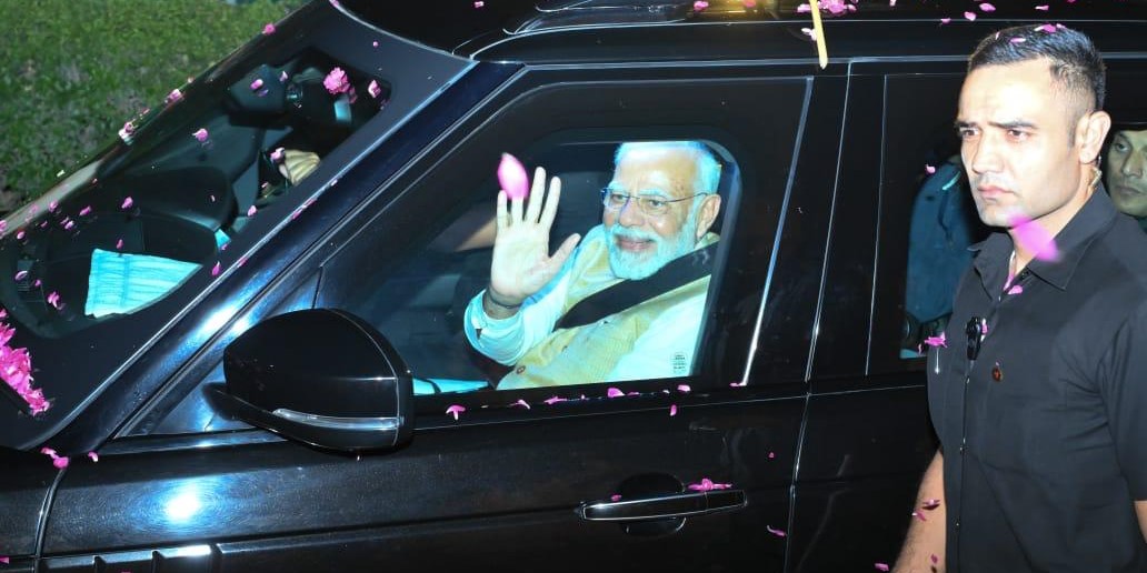 Narendra Modi in Andhra Pradesh Prime Minister Narendra Modi waves at the public at a roadshow in Visakhapatnam on Friday, 11 November, 2022. (Supplied)