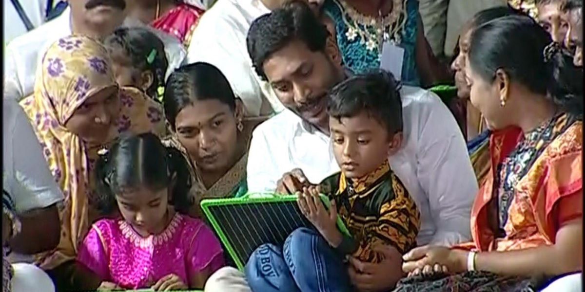AP Chief Minister YS Jagan with school children. (AndhraPradeshCM/Twitter)