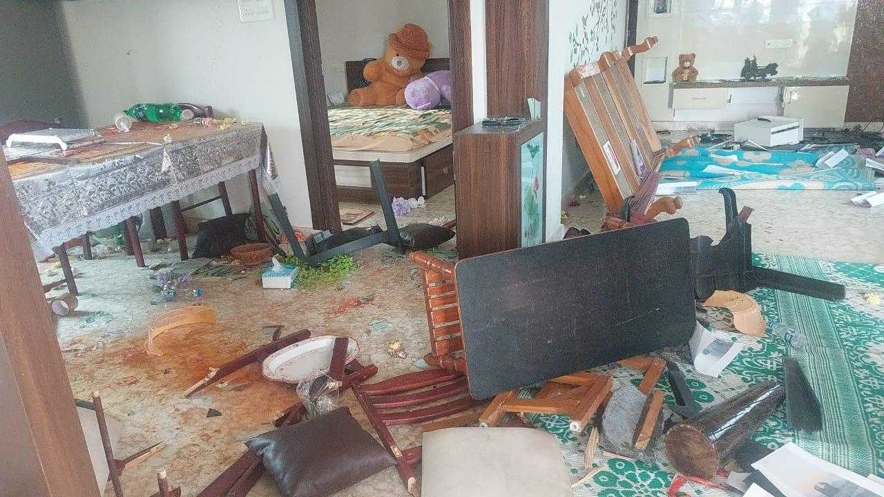 The mob vandalised the woman's house before forcefully taking her away. (Supplied)