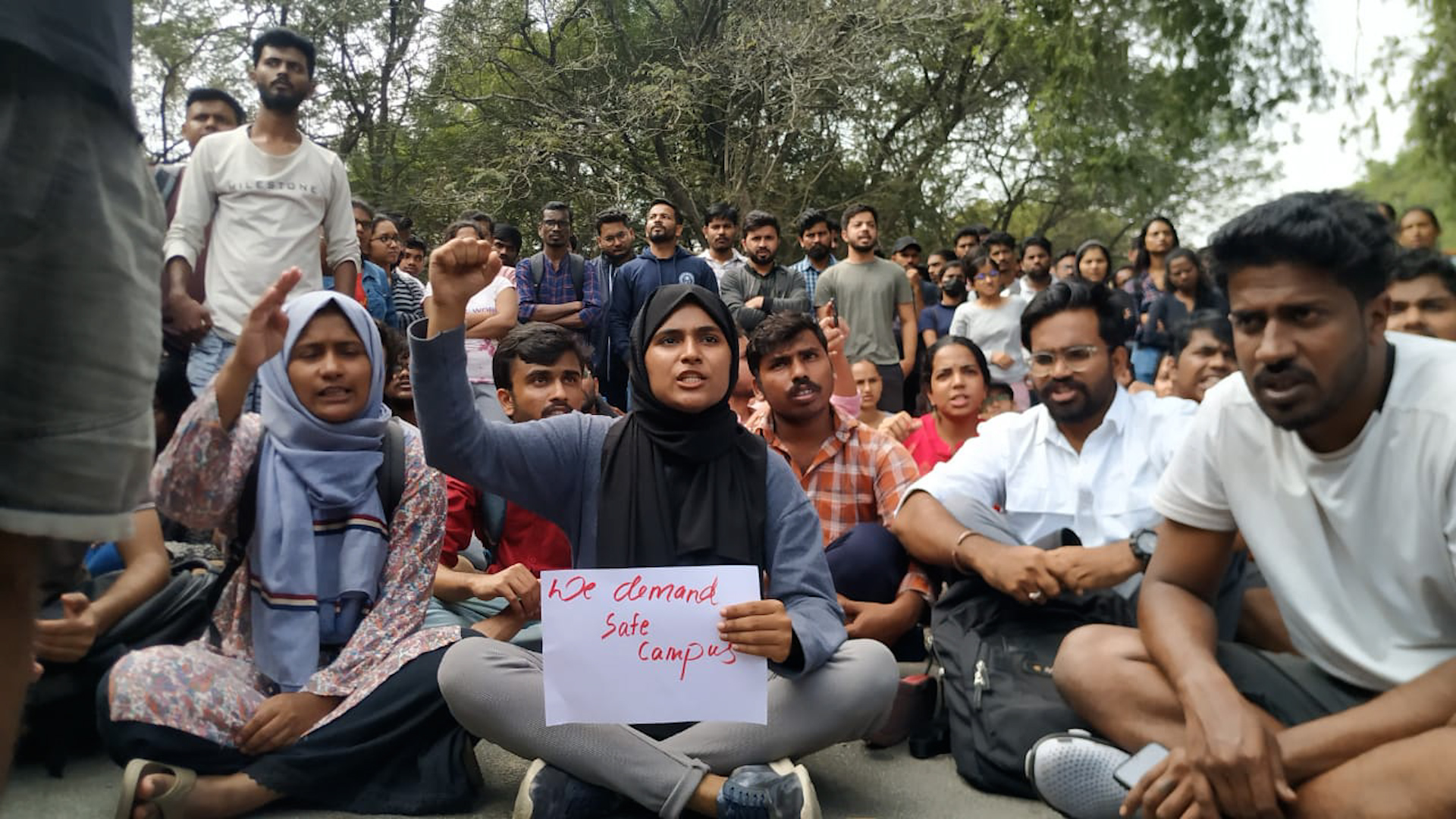 Protests on University of Hyderabad campus over sexual assault on student by professor.