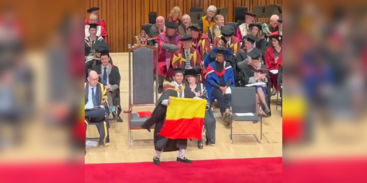 Indian student Adish R Wali unfurling Karnataka flag during graduation ceremony held at London recently. (Screengrab)