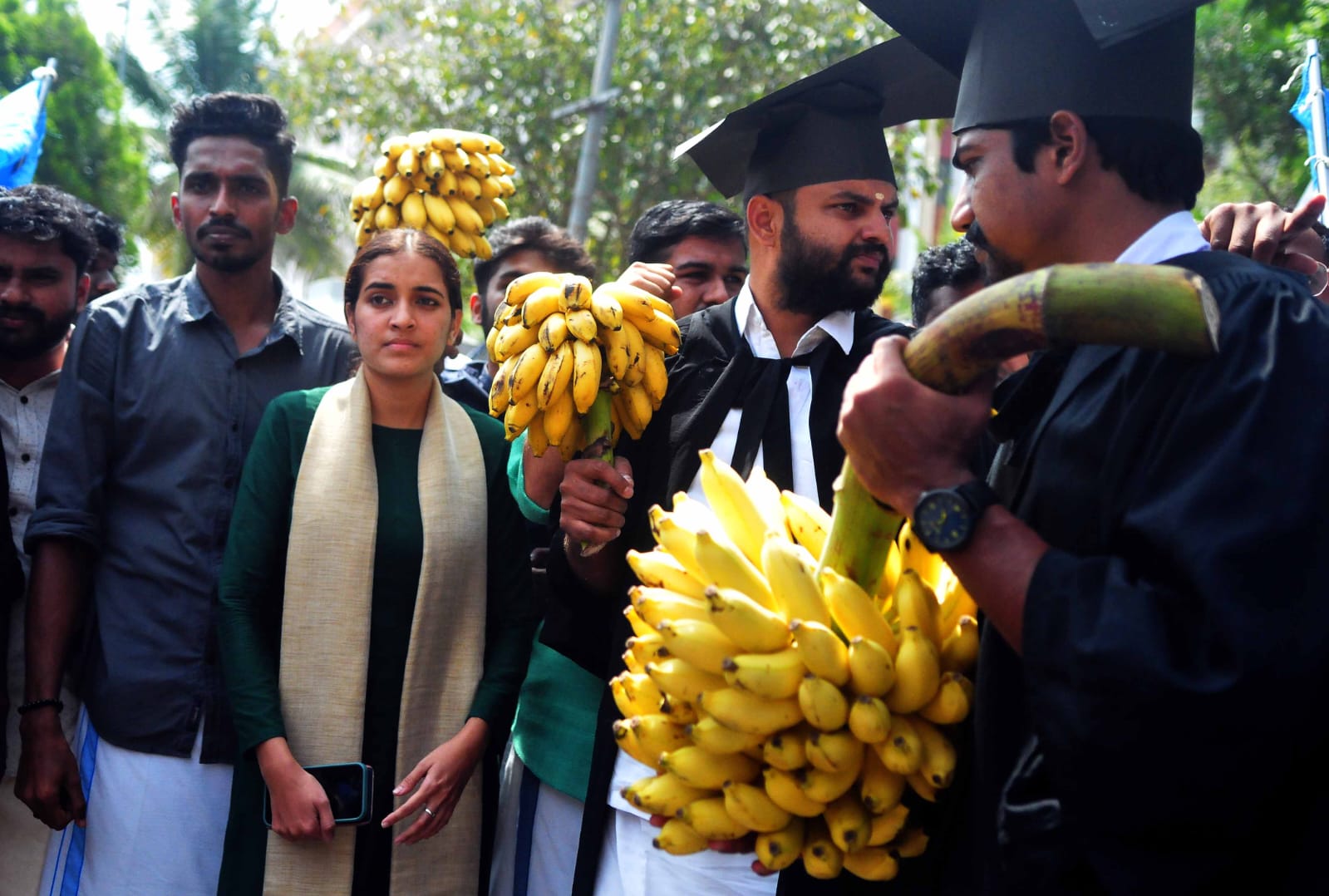 KSUBanana KSU workers took out a protest rally to Kerala State Youth Commission officer demanding the withdrawal of the doctorate awarded to Chintha Jerome. (KB Jayachandran)