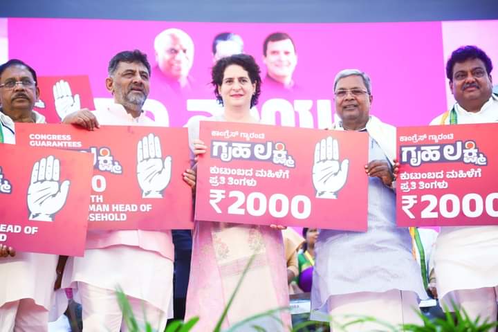 Priyanka-Lakshmi AICC General Secretary Priyanka Gandhi announced Gruha Lakshmi Yojana at Palace Grounds in Bengaluru. (Supplied)