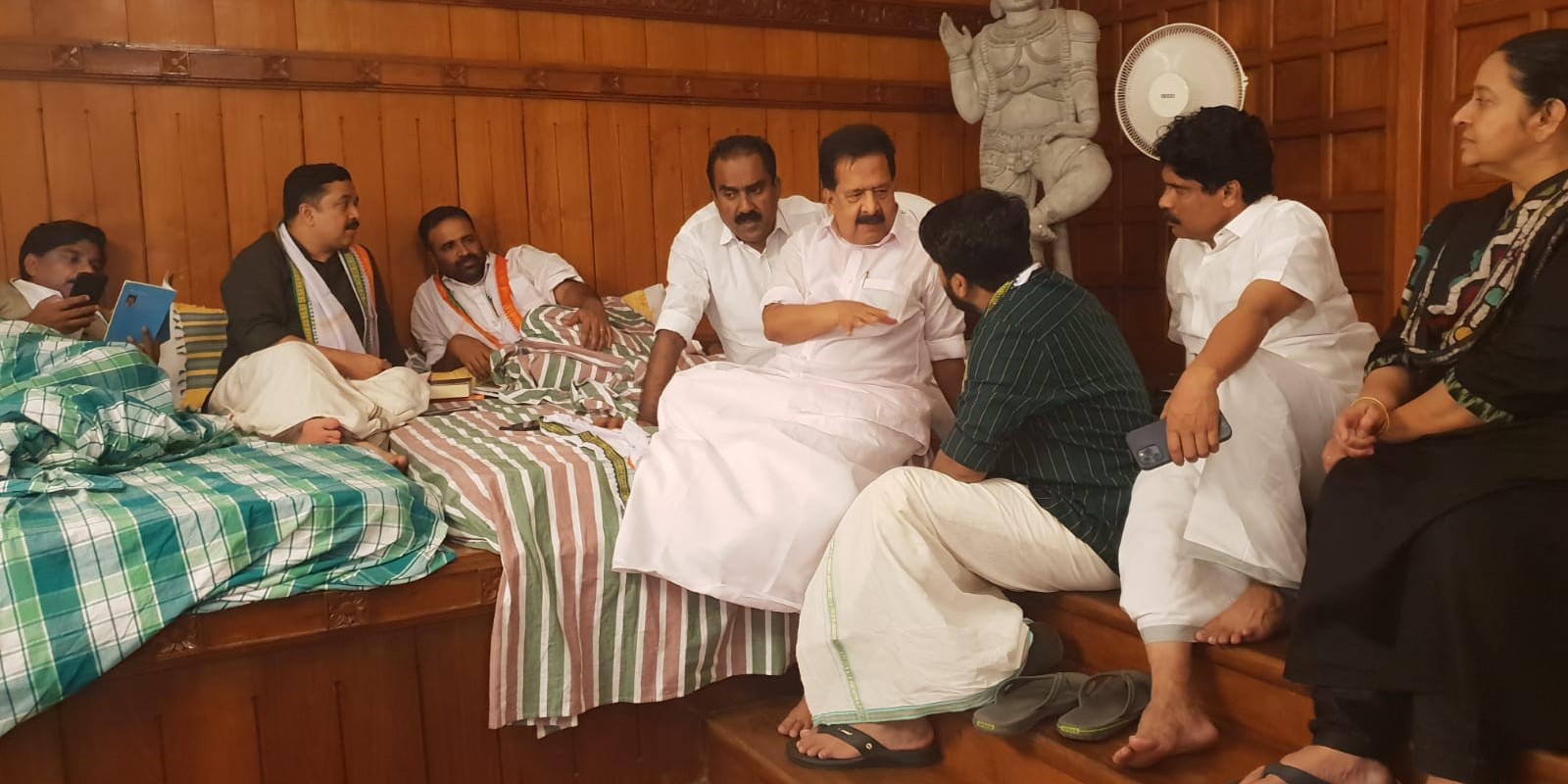 Congress leader Ramesh Chennithala visiting the MLAs who ae staging protest in front of the Kerala Assembly. (chennithala/Twitter) Kerala fuel cess