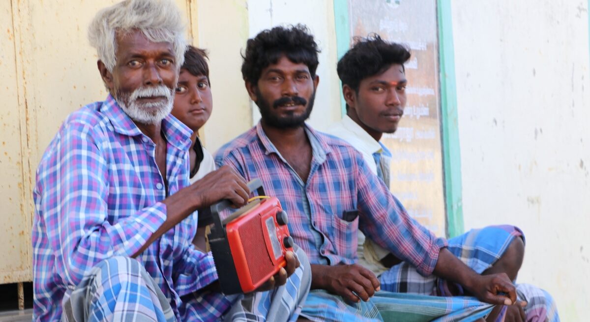Kadal Osai A group of fishermen listening to the radio Kadal Osai FM 90.4 in Pamban