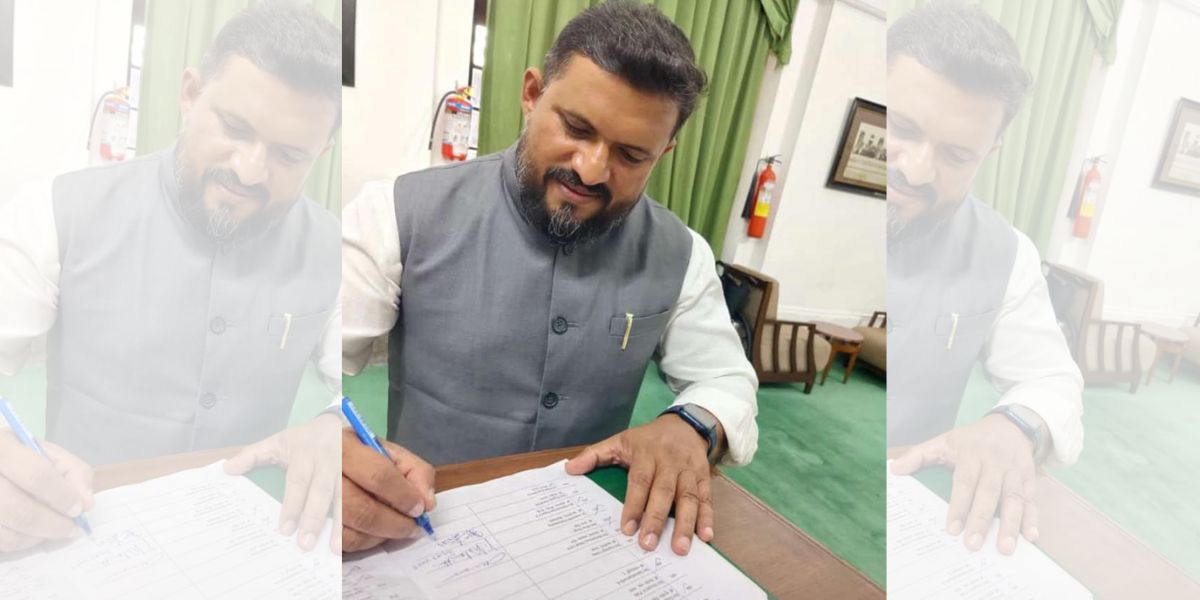 Lakshadweep MP Mohammad Faizal signing the attendance sheet of Lok Sabha on the day he was reinstated as an MP. (Supplied) Lakshadweep MP Mohammad Faizal signing the attendance sheet of Lok Sabha on the day he was reinstated as an MP. (Supplied)
