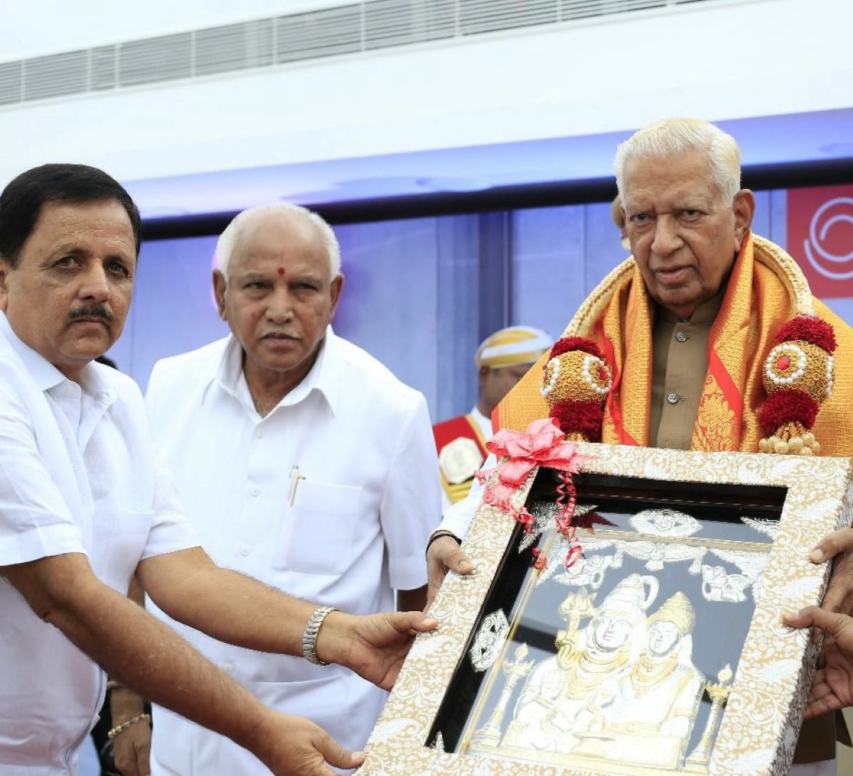 Madal Virupakshappa with BS Yediyurappa and former Karnataka Governor Vajubhai Vala. Madal Virupakshappa (Left) with BS Yediyurappa and former Karnataka Governor Vajubhai Vala