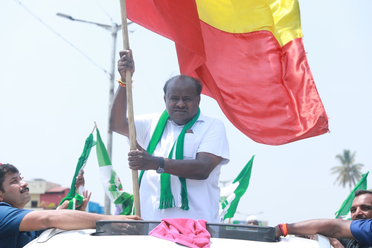 HD Kumaraswamy HD Kumaraswamy with the JD(S) flag