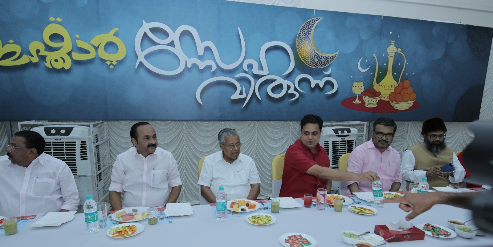 Kerala politicians including CM Pinarayi Vijayan, Assembly Speaker AN Shamseer and others during the Iftar party organised by LoP VD Satheesan. (Facebook) Kerala politicians including CM Pinarayi Vijayan, Assembly Speaker AN Shamseer and others during the Iftar party organised by LoP VD Satheesan. (Facebook)