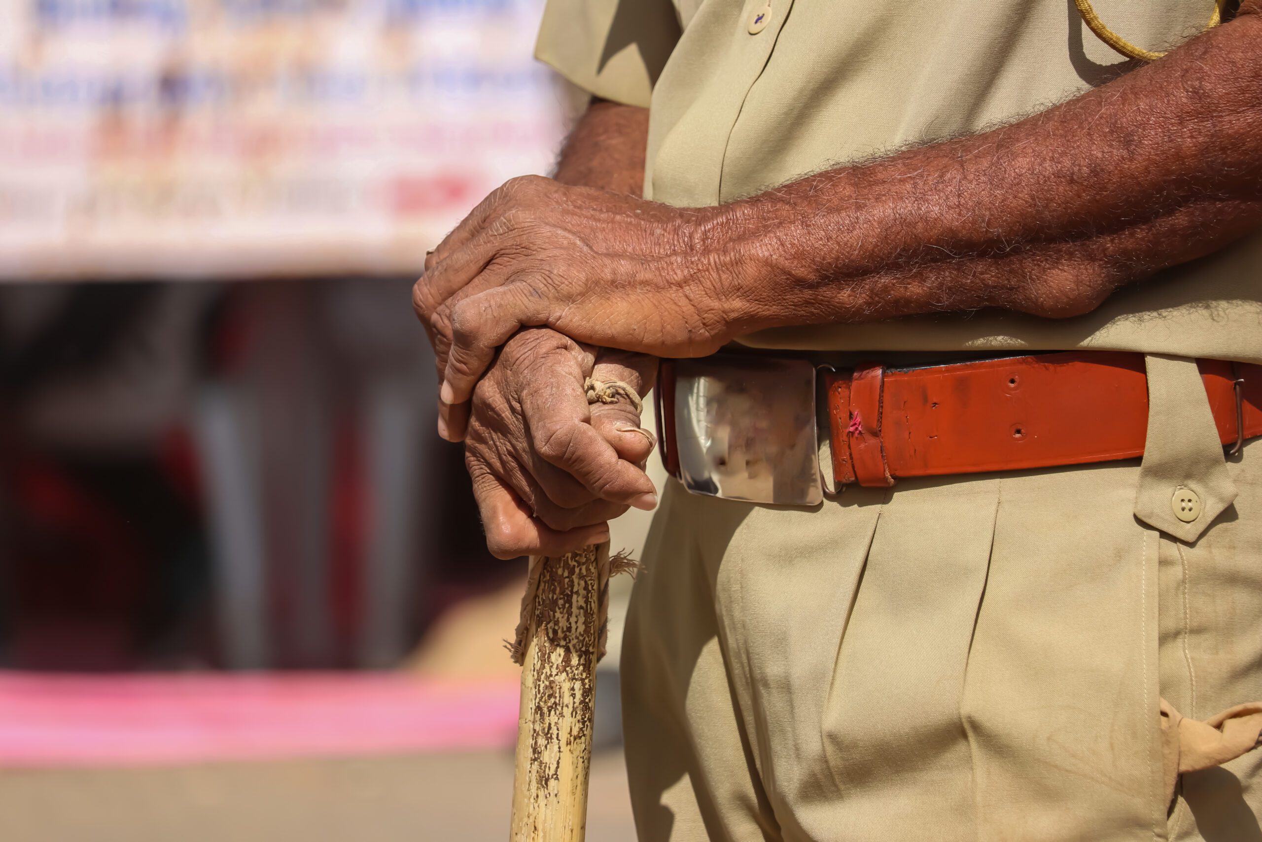 Indian policeman close to Police stick and uniform,  Indian policeman (CRPF) with bamboo sticks patrols, selective focus, Hand in hand police man view The incident occurred in Chethapoor near Kottiyam in the Kollam district of Kerala on the evening of Sunday, 16 April.