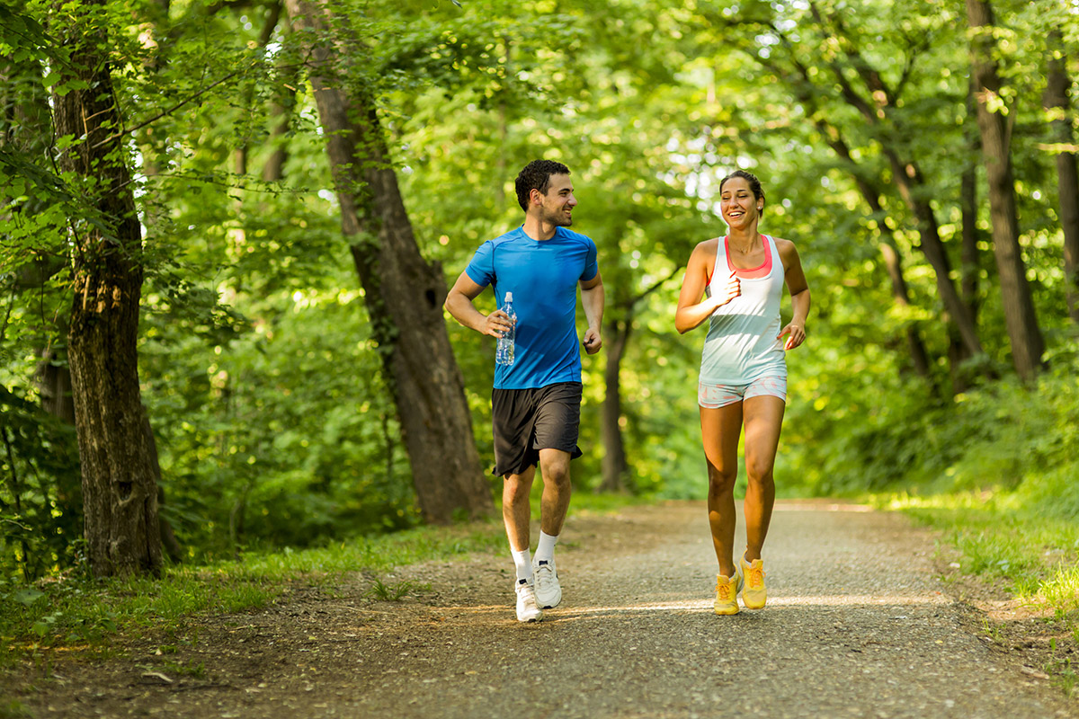 couple running Running during summer heat. What are some precautions to take.