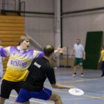 Ultimate Frisbee on turf.