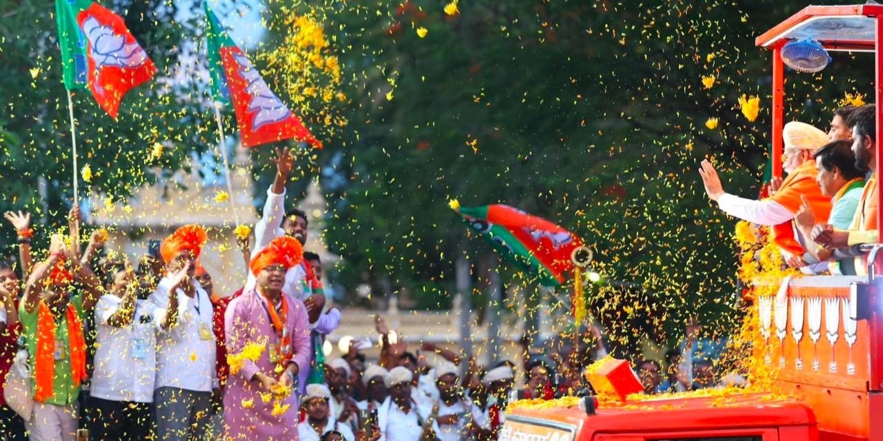 PM Modi at a roadshow in Karnataka PM Modi at a roadshow in Karnataka