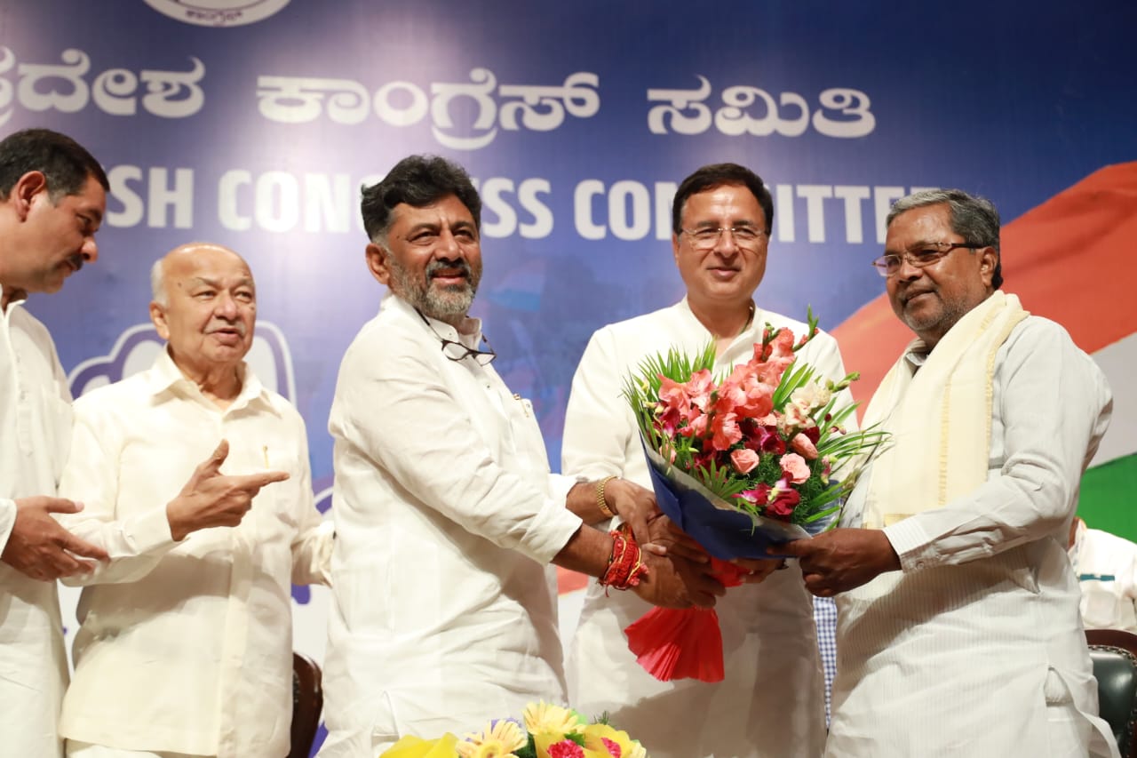 WhatsApp Image 2023-05-19 at 7.23.33 PM CM Designate Siddaramaiah and DyCM Designate DK Shivakumar with Randeep Singh Surjewala (AICC General Secretary)