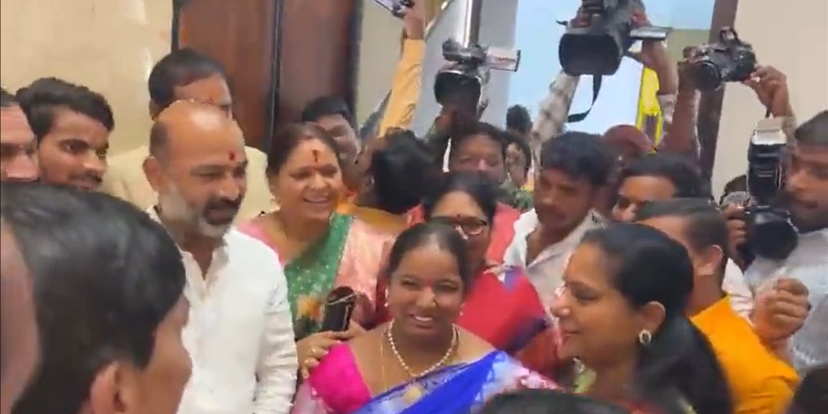 Bandi Sanjay greeting K Kavitha.