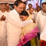 CM KCR consoles a kin of a martyr at Telangana martyr's memorial inauguration