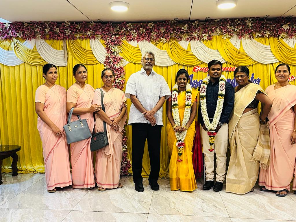 Dr. Gandhimathinathan with Rita and Joseph on their engagement day. (supplied)