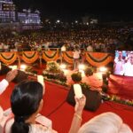 Telangana CM KCR, other Ministers and audience lighting candlesat the inauguration of Telangana Martyr's Memorial