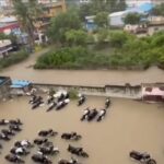 Visuals of vehicles submerged in Warangal district. (Supplied)