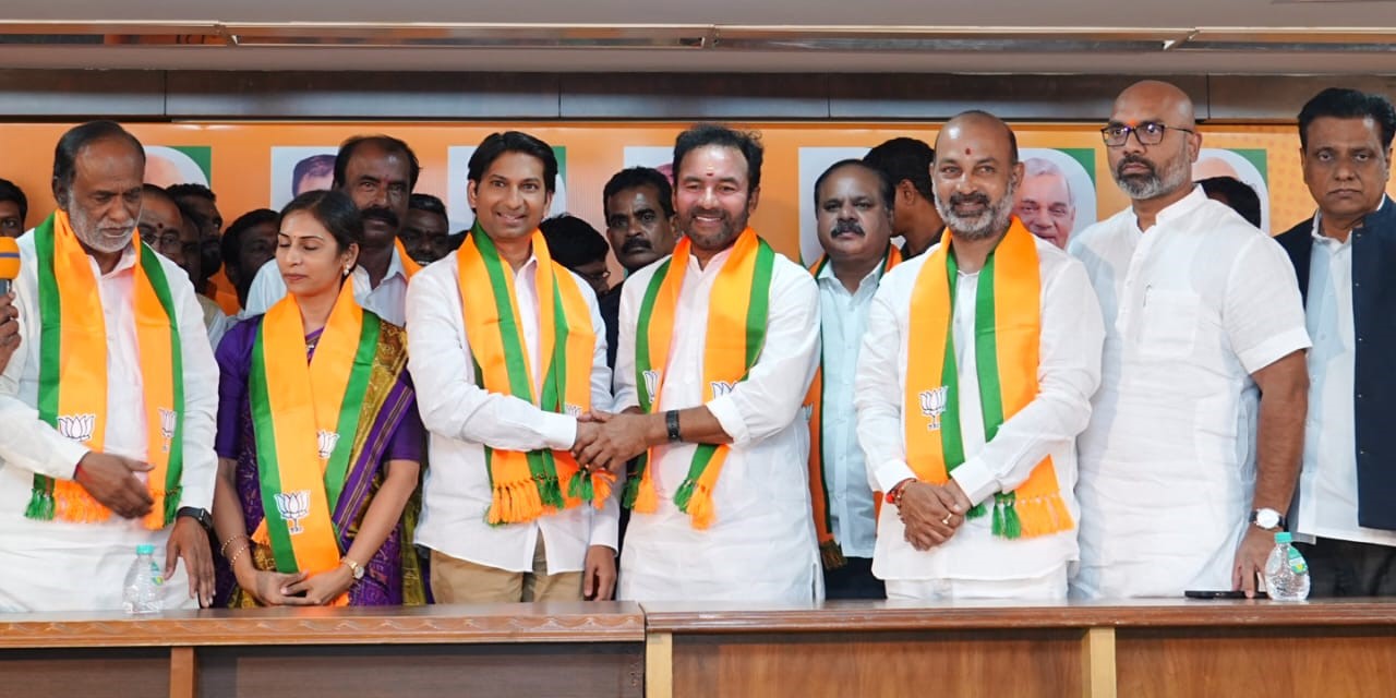 Vikas Rao and wife with BJP’s Telangana leadership. (X) Vikas Rao BJP