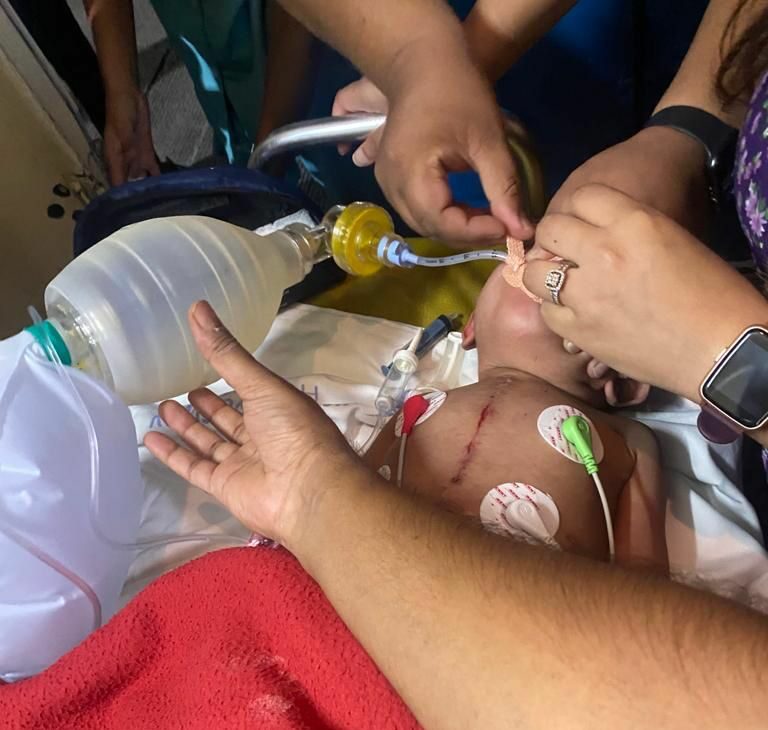 babyboard Two year old baby saved mid-air by five AIIMS doctors on board Vistara airlines.