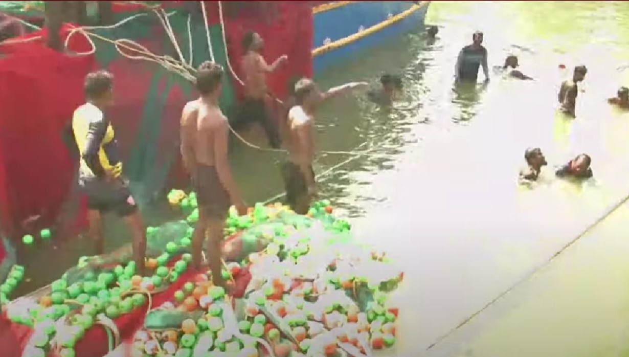 Fishermen trying to get the sunken boat out of the water (supplied)