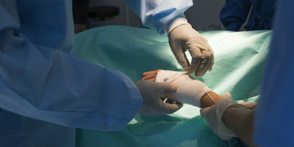 A hand surgery in process.