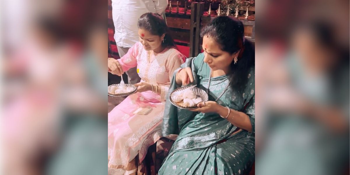 BRS MLC Kavitha in the roadside eatery. (Screengrab) BRS MLC Kavitha yields to gastronomic predilections on a visit to the Kamakhya temple in Assam