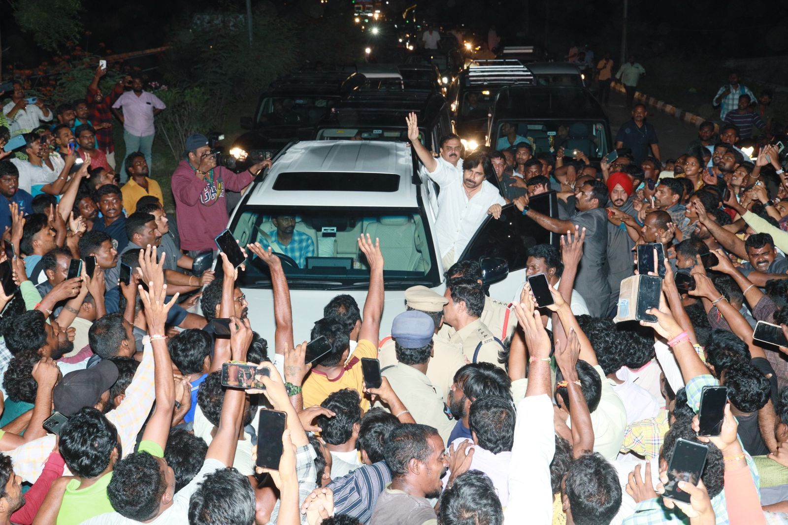 Pawan Kalyan and his supporters after they were stopped bu Andhra Pradesh police. (Supplied) Pawan Kalyan on his way to Vijaywada