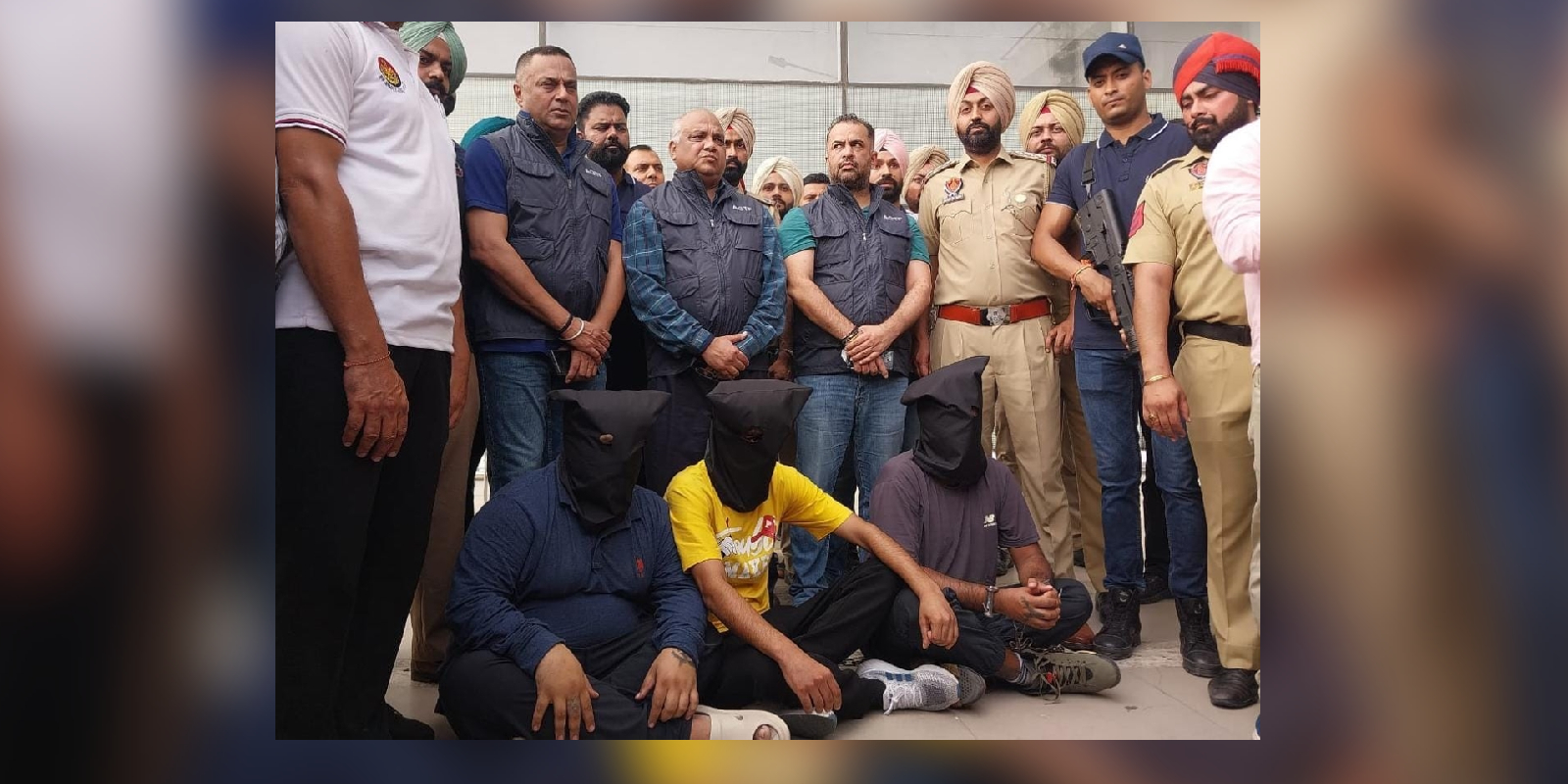 Punjab police with the three arrested shooters