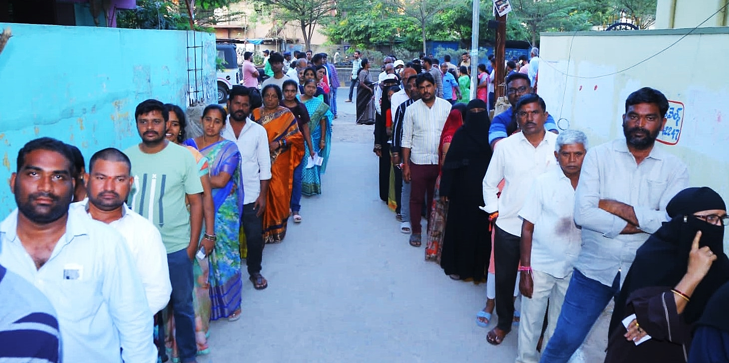 Voters at a polling booth in Telangana on Thursday, 30 November, 2023.