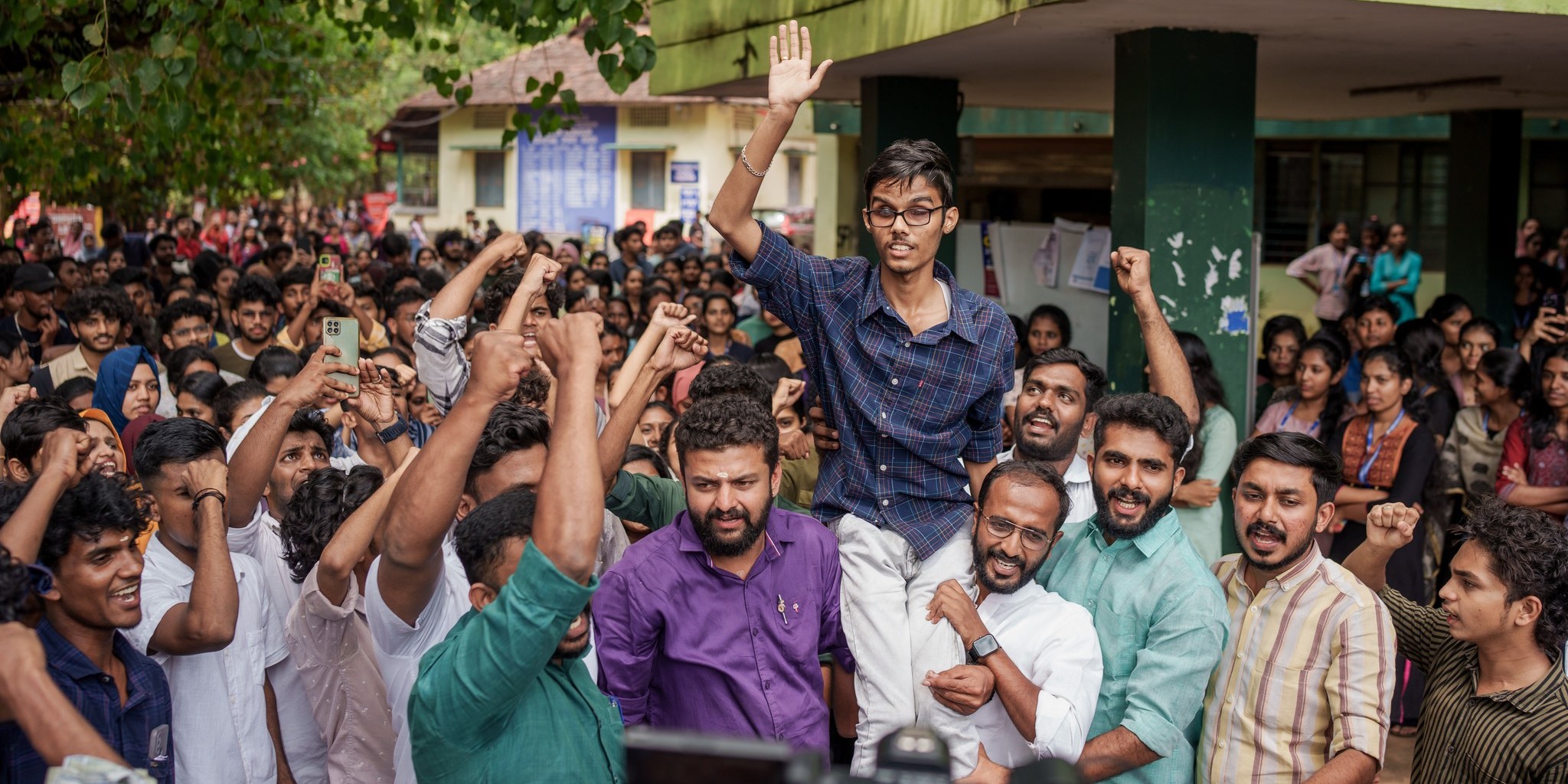 KSU leaders including state president Aloshious Xavier carrying KSU candidate Sreekuttan. (Facebook) Kerala Varma College election