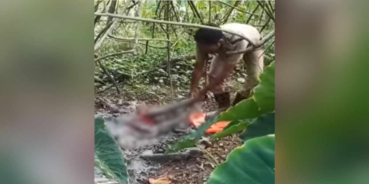 Fire and Rescue personnel helping Kamalakshi Amma.