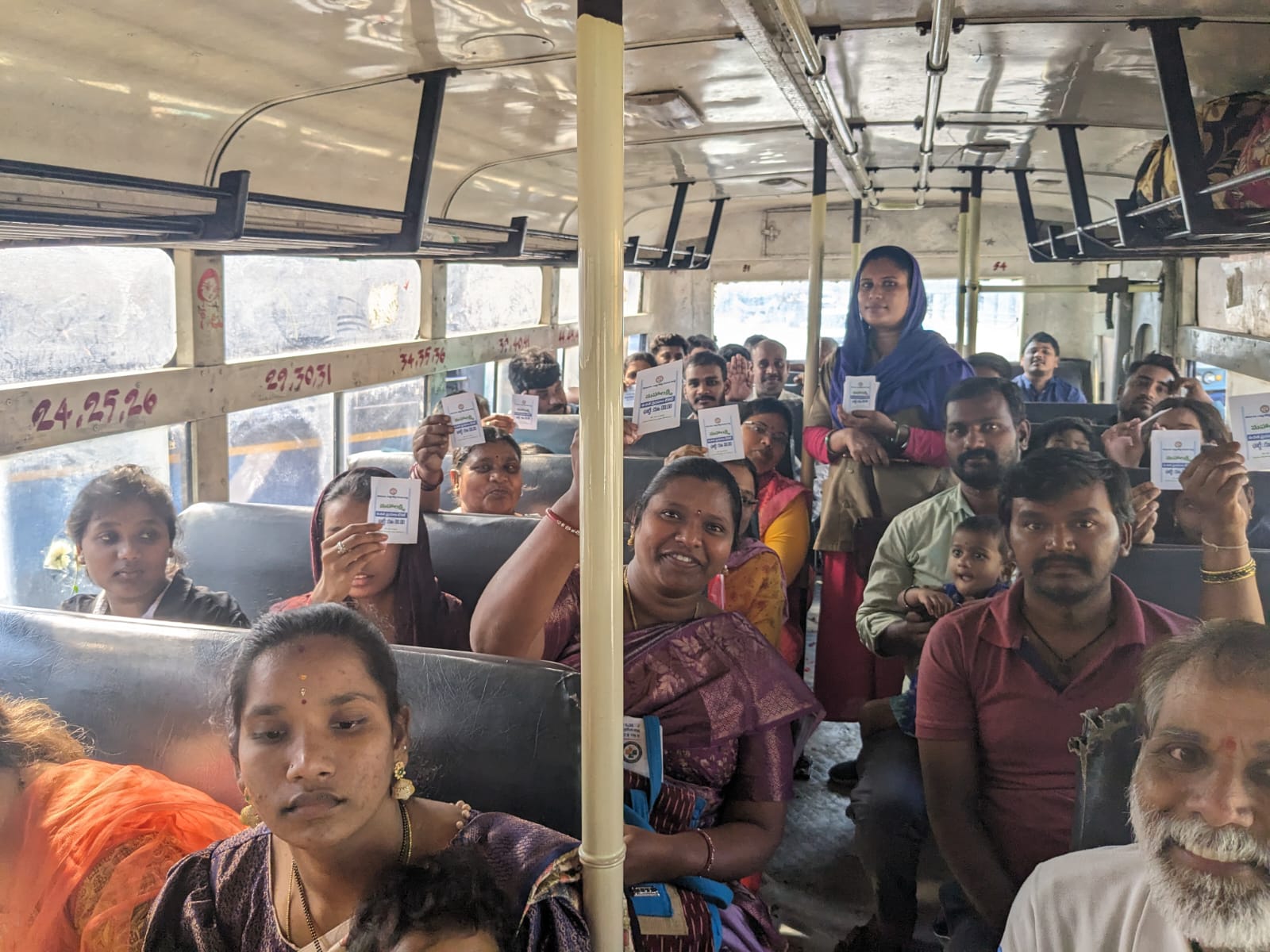 Mahalakshmi An ID card is mandatory for availing free travel on state-run non-luxury buses within Telangana. In picture, women riding the inaugural service. (Supplied)