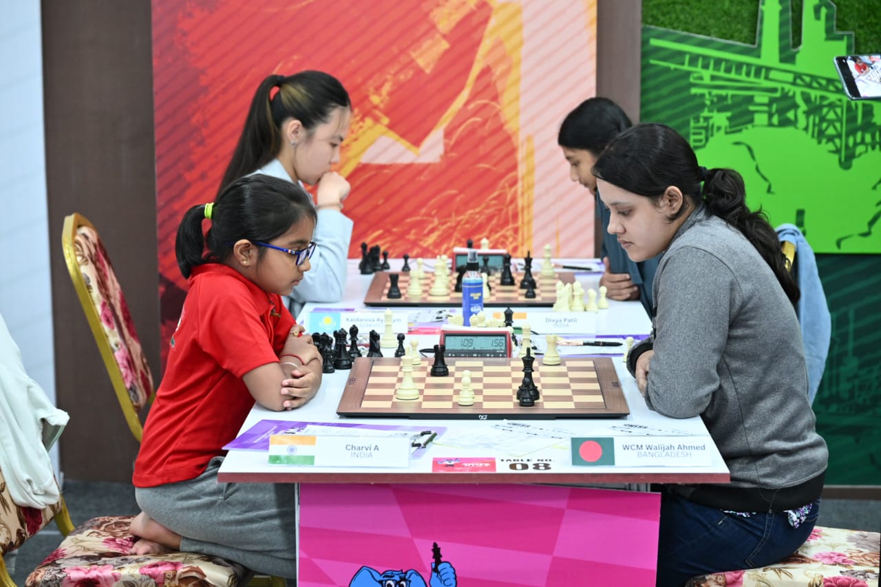 Charvi Anilkumar (left) playing a tournament in 2023 Charvi Anilkumar (left) playing a tournament in 2023