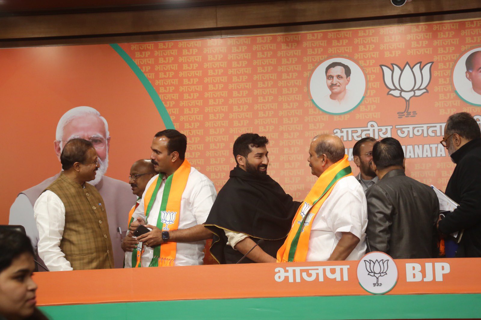 P C George and his son Shaun joining BJP in Delhi. P C George and his son Shaun joining BJP in Delhi.